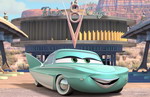 Flo in front of café